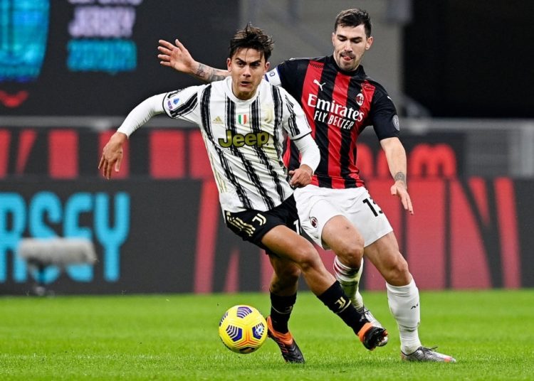 Dybala of Juventus and Alessio Romagnoli of AC Milan