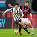 Dybala of Juventus and Alessio Romagnoli of AC Milan