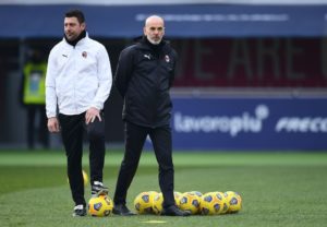 Stefano Pioli and Daniele Bonera of AC Milan