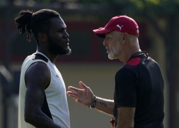 Kessie of AC Milan with coach Pioli