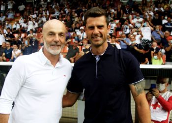 Thiago Motta of Spezia and Stefano Pioli of AC Milan