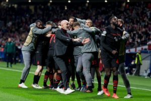 AC Milan players celebrate vs Atlético Madrid