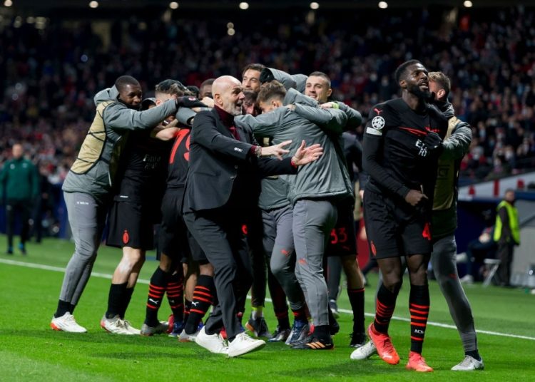 AC Milan players celebrate vs Atlético Madrid