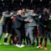 AC Milan players celebrate vs Atlético Madrid