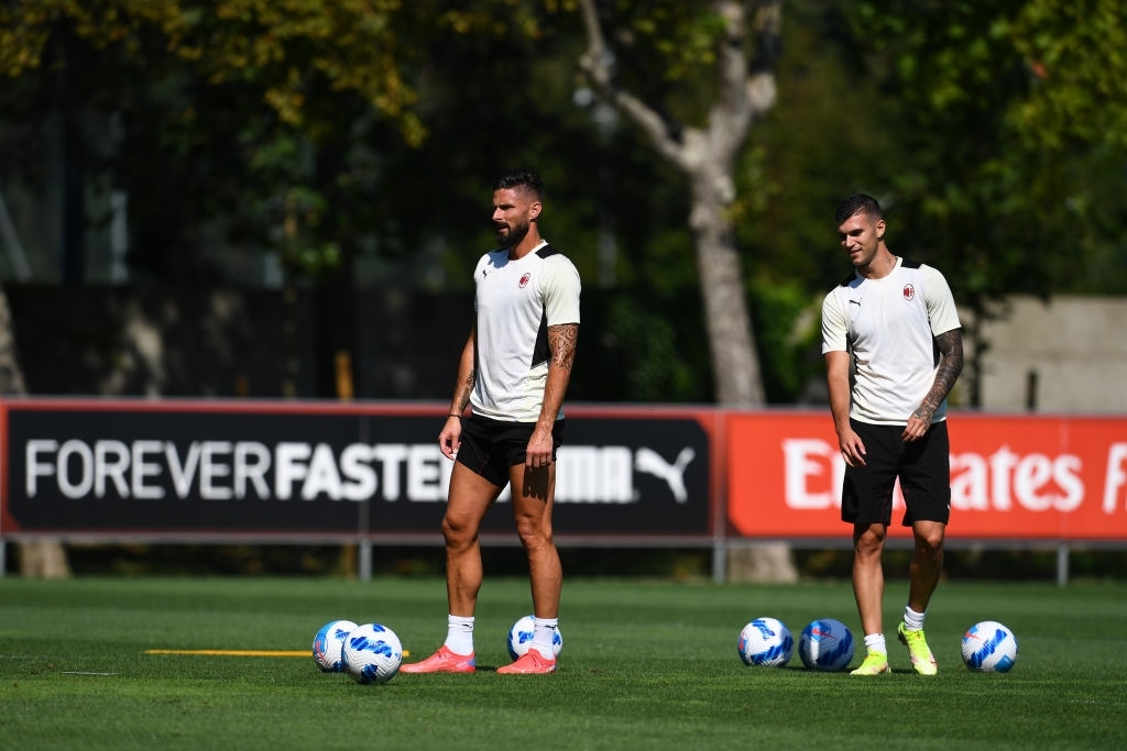 Olivier Giroud and Pietro Pellegri of AC Milan
