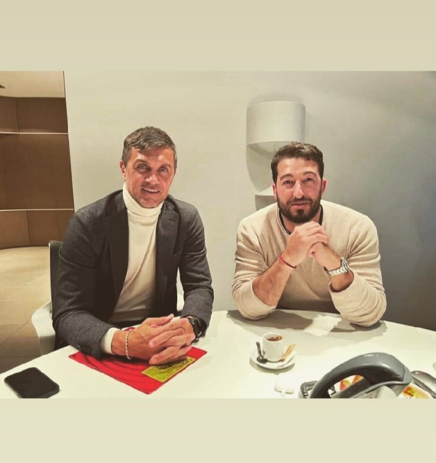 Paolo Maldini of AC Milan meets an agent at Casa Milan