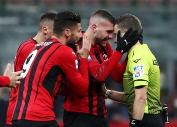 AC Milan players and Marco Serra