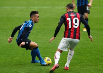 Theo Hernandez of AC Milan and Lautaro Martinez of Inter