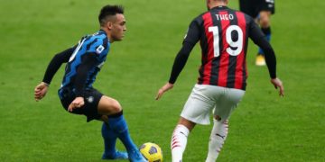 Theo Hernandez of AC Milan and Lautaro Martinez of Inter