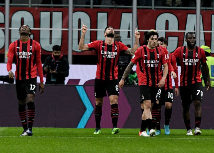 AC Milan players celebrate