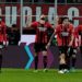 AC Milan players celebrate