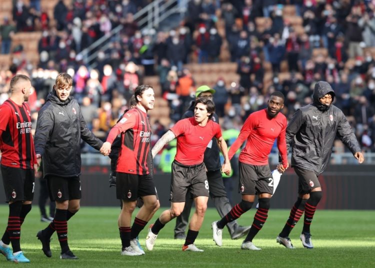 AC Milan players celebrate