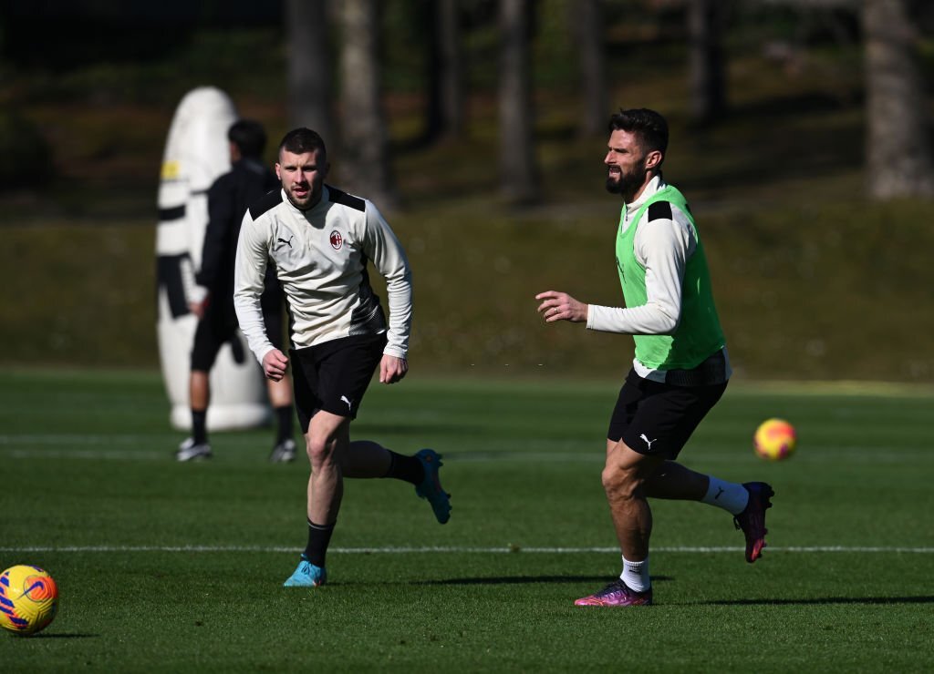 Olivier Giroud and Ante Rebic of AC Milan