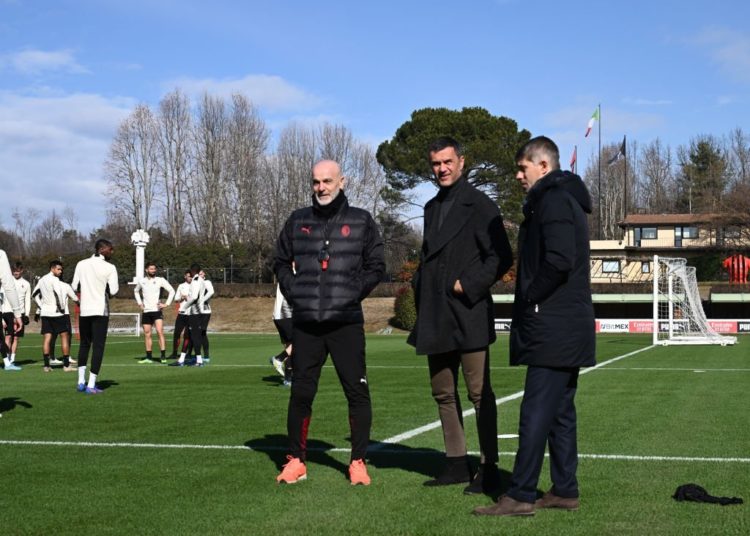 Stefano Pioli, Paolo Maldini and Frederic Massara of AC Milan