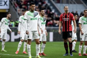 Gianluca Scamacca of Sassuolo and Zlatan Ibrahimovic of AC Milan