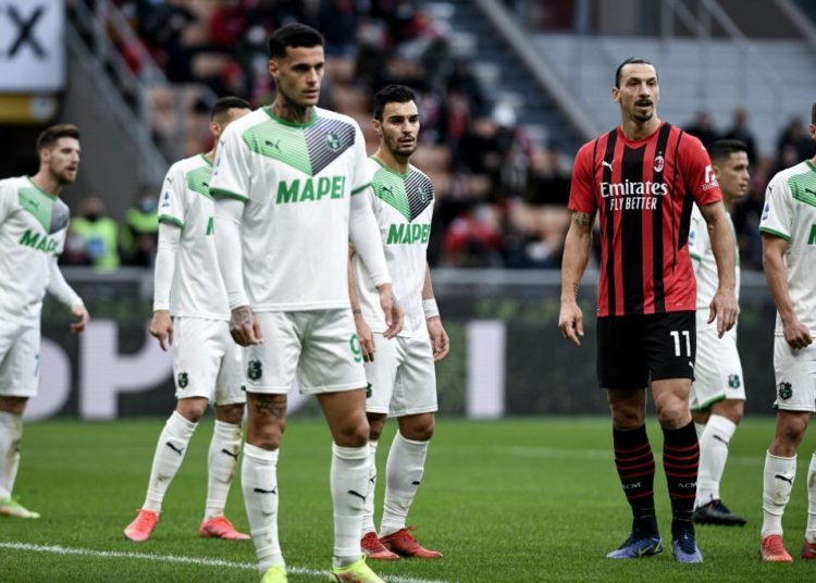 Gianluca Scamacca of Sassuolo and Zlatan Ibrahimovic of AC Milan