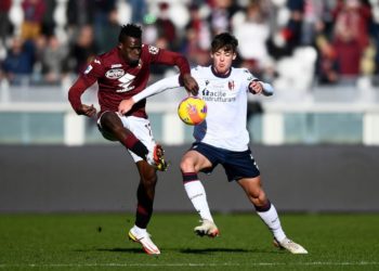 Wilfried Singo of Torino vs Aaron Hickey of Bologna