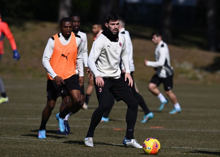 Pierre Kalulu and Alessio Romagnoli of AC Milan