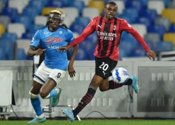 Pierre Kalulu of AC Milan and Victor Osimhen of Napoli