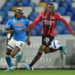 Pierre Kalulu of AC Milan and Victor Osimhen of Napoli