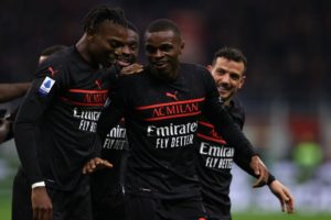 Pierre Kalulu and AC Milan players celebrate