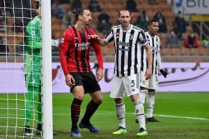 Giorgio Chiellini of Juventus and Zlatan Ibrahimovic of AC Milan