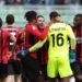 Mike Maignan and AC Milan players celebrate