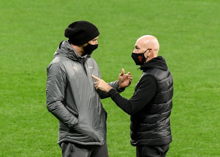 Zlatan Ibrahimovic and Stefano Pioli of AC Milan