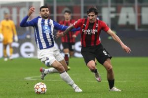 Mehdi Taremi of Porto and Sandro Tonali of AC Milan