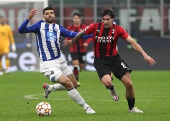 Mehdi Taremi of Porto and Sandro Tonali of AC Milan