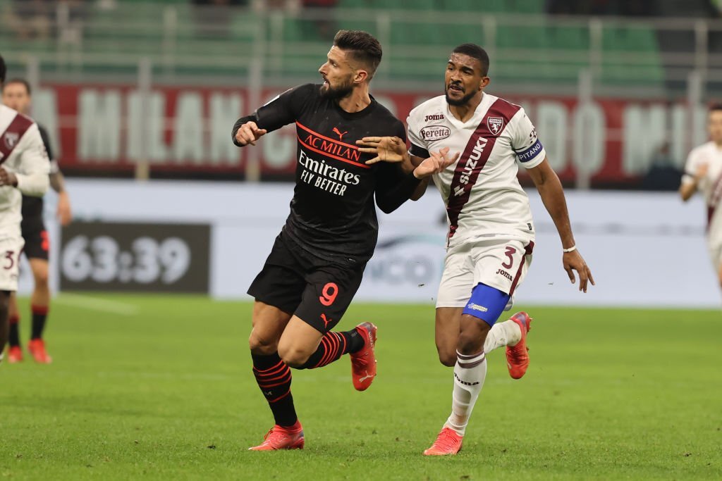 Olivier Giroud of AC Milan and Gleison Bremer of Torino