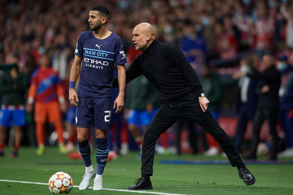 Pep Guardiola and Riyad Mahrez