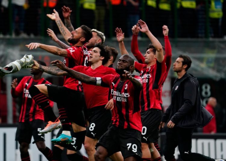 AC Milan players celebrate