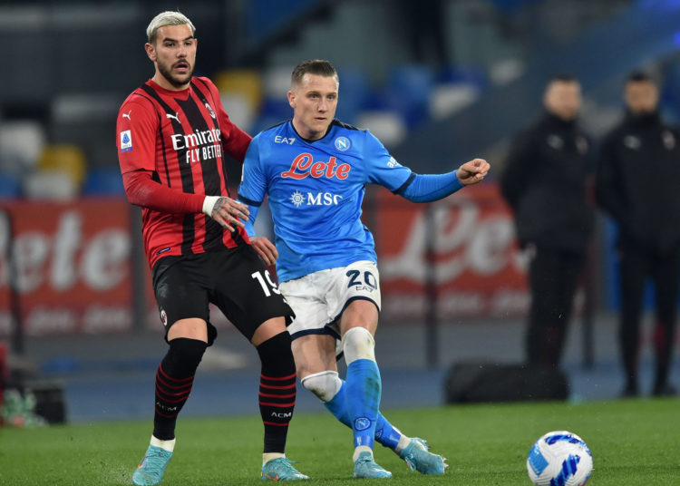 Piotr Zielinski of Napoli and Theo Hernandez of AC Milan