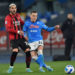Piotr Zielinski of Napoli and Theo Hernandez of AC Milan