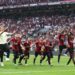 AC Milan players celebrate