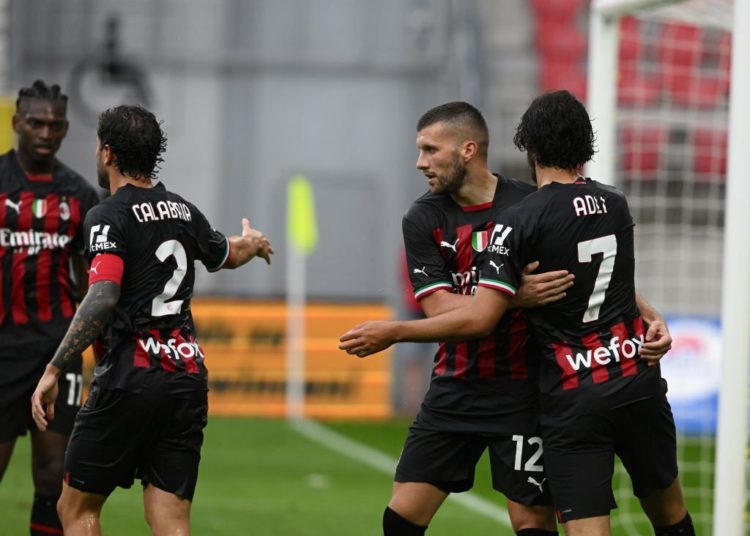 AC Milan players celebrate