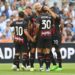 AC Milan players celebrate