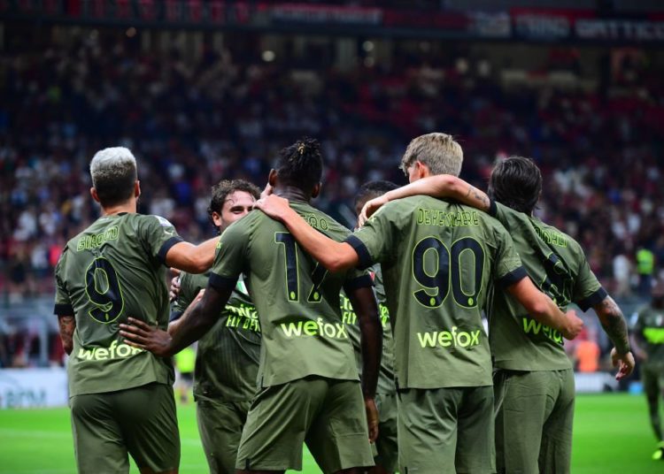 AC Milan players celebrate