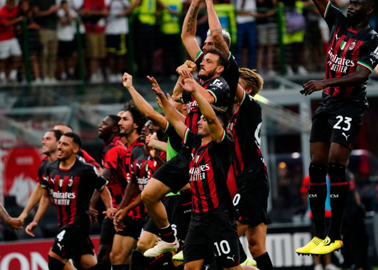 AC Milan players celebrate