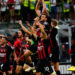 AC Milan players celebrate