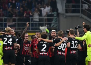 AC Milan players celebrate