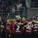 AC Milan players celebrate