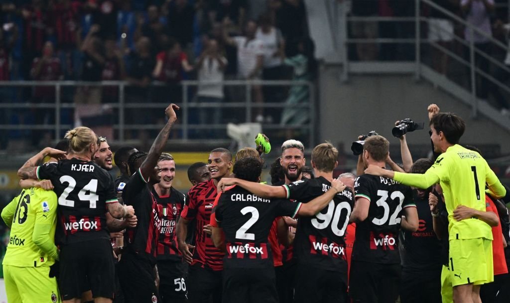 AC Milan players celebrate