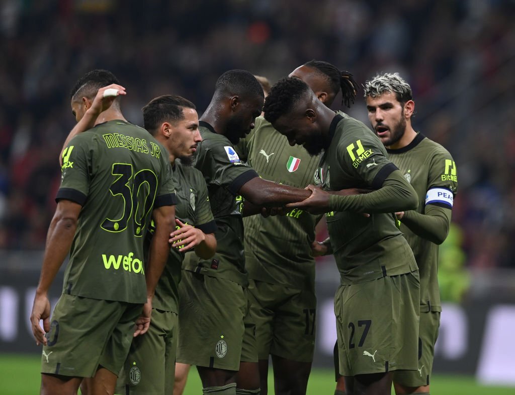 AC Milan players celebrate