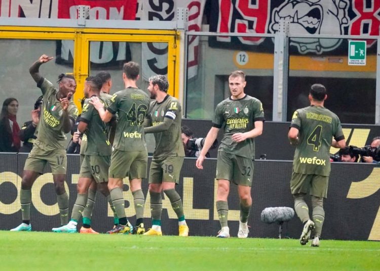 AC Milan players celebrate