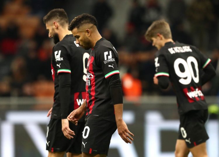 AC Milan players looking dejected
