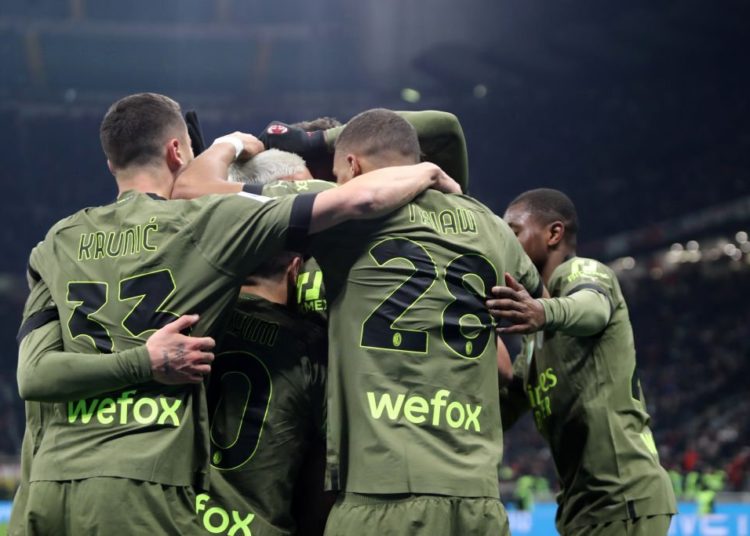 AC Milan players celebrate