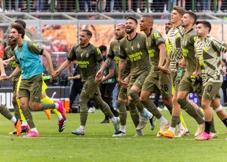 AC Milan players celebrate