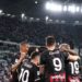 AC Milan players celebrate